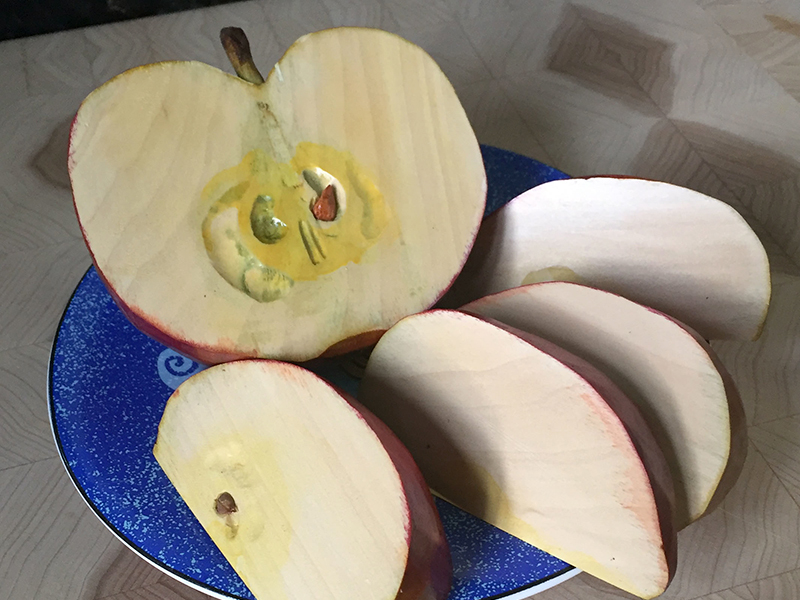Carved apple of Tupelo wood